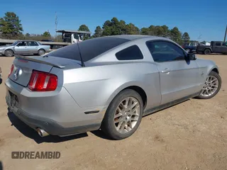 2012 Ford Mustang V6 Premium with VIN 1ZVBP8AM1C5224001, listed as a IAAI auction lot 41385559 with 165,123 mi miles. Bid and sale history available at carsss.com. Image 4.