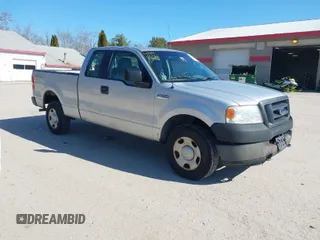 2005 Ford F-150 STX with VIN 1FTRX14W75FB45211, listed as a IAAI auction lot 41998529 with 325,970 mi miles. Bid and sale history available at carsss.com. Image 1.