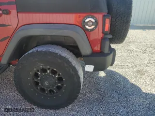 2012 Jeep Wrangler Unlimited Sport with VIN 1C4BJWDG4CL212726, listed as a Copart auction lot 49851525 with 125,566 mi miles and Salvage Title. Bid and sale history available at carsss.com. Image 12.