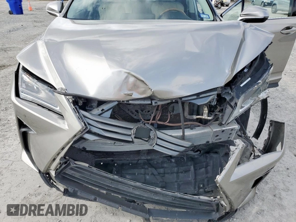 2017 Lexus RX 450h with VIN 2T2BGMCAXHC008829, listed as a Copart auction lot 61410365 with 70,463 mi miles and Salvage title. Bid and sale history available at DreamBid. Image 11.