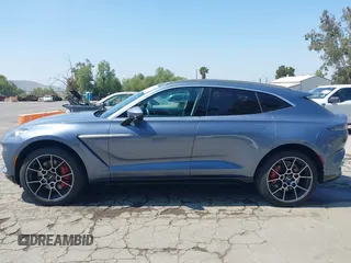 2021 Aston Martin DBX z VIN SCFVUJAW8MTV02568, wystawiony jako IAAI lot #42183964 z przebiegiem 53 608 mil mil oraz . Historia ofert i sprzedaży dostępna na DreamBid. Obrazek 14.