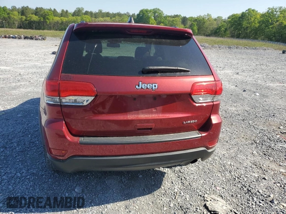 2014 Jeep Grand Cherokee Laredo with VIN 1C4RJEAG7EC274573, listed as a Copart auction lot 52637255 with 156,409 mi miles and Salvage Title. Bid and sale history available at DreamBid. Image 6.