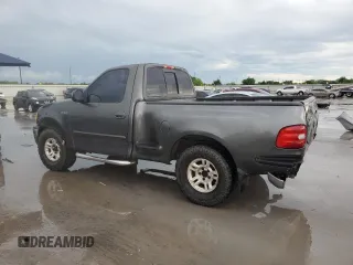 2003 Ford F-150 XL z VIN 1FTRF17263NA29013, wystawiony jako Copart lot #55668355 z przebiegiem 202 416 mil mil oraz Szkoda całkowita • Salvage title. Historia ofert i sprzedaży dostępna na DreamBid. Obrazek 2.