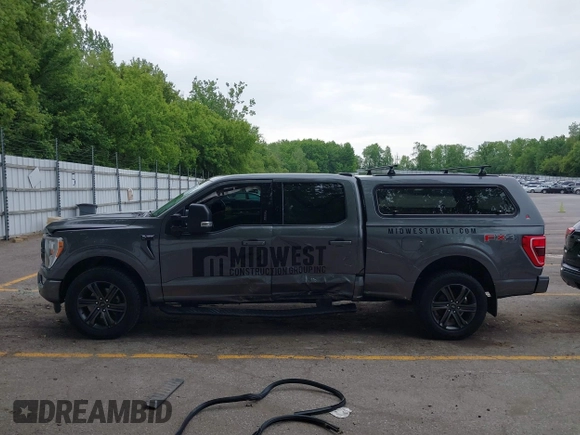 2021 Ford F-150 XL with VIN 1FTFW1E58MFA37383, listed as a IAAI auction lot 42396331 with 149,965 mi miles and . Bid and sale history available at DreamBid. Image 14.