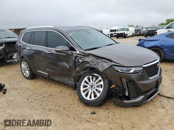 2020 Cadillac XT6 FWD Premium Luxury with VIN 1GYKPCRS5LZ225809, listed as a Copart auction lot 50485045 with 19,821 mi miles and Salvage title. Bid and sale history available at DreamBid. Image 4.