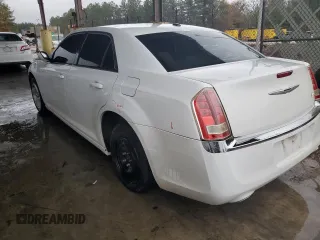 2011 Chrysler 300 with VIN 2C3CA4CG7BH526350, listed as a Copart auction lot 84031134 with 216,322 mi miles and Salvage Title. Bid and sale history available at carsss.com. Image 2.