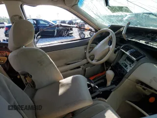 2000 Toyota Avalon XL with VIN 4T1BF28B3YU052196, listed as a Copart auction lot 52336615 with Not Provided miles and Non Repairable. Bid and sale history available at DreamBid. Image 7.