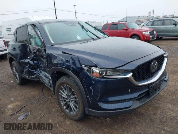 2020 Mazda CX-5 Touring with VIN JM3KFBCM9L0799502, listed as a IAAI auction lot 42007207 with 43,364 mi miles. Bid and sale history available at carsss.com. Image 1.