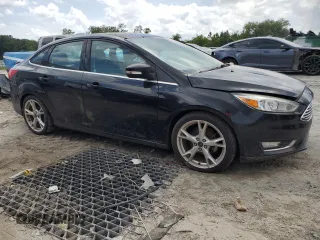 2015 Ford Focus Titanium with VIN 1FADP3J28FL362590, listed as a Copart auction lot 59759495 with 58,644 mi miles and Clean title. Bid and sale history available at DreamBid. Image 4.