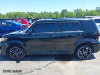 2012 Scion xB with VIN JTLZE4FE0CJ008816, listed as a IAAI auction lot 42022348 with 179,463 mi miles. Bid and sale history available at carsss.com. Image 14.