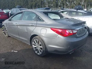 2013 Hyundai Sonata Limited with VIN 5NPEC4AB4DH558754, listed as a IAAI auction lot 39115355 with 113,960 mi miles and . Bid and sale history available at DreamBid. Image 3.