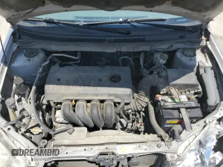 2006 Toyota Corolla CE z VIN 1NXBR32E06Z673649, wystawiony jako Copart lot #56927735 z przebiegiem 299 999 mil mil oraz Szkoda całkowita • Salvage title. Historia ofert i sprzedaży dostępna na DreamBid. Obrazek 11.