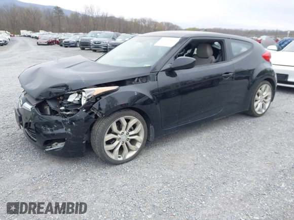 2012 Hyundai Veloster w/Gray Int z VIN KMHTC6AD6CU054422, wystawiony jako IAAI lot #41930634 z przebiegiem 144 681 mil mil oraz . Historia ofert i sprzedaży dostępna na DreamBid. Obrazek 2.