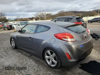 2014 Hyundai Veloster RE:FLEX z VIN KMHTC6AD2EU216453, wystawiony jako Copart lot #87090324 z przebiegiem 147 771 mil mil oraz Czysty tytuł • Clean title. Historia ofert i sprzedaży dostępna na DreamBid. Obrazek 2.