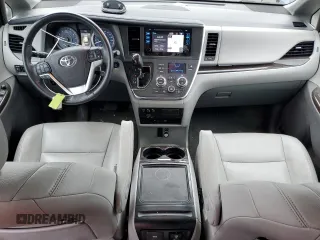 2017 Toyota Sienna XLE with VIN 5TDDZ3DC8HS166630, listed as a Copart auction lot 63404205 with 93,018 mi miles and Salvage title. Bid and sale history available at DreamBid. Image 8.