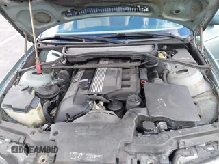 2005 BMW 3 Series 325i with VIN WBAEV33415KW16936, listed as a IAAI auction lot 41094134 with 208,794 mi miles. Bid and sale history available at carsss.com. Image 10.
