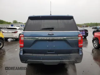 2020 Ford Expedition XL with VIN 1FMJU1GTXLEA78111, listed as a Copart auction lot 58079055 with 76,664 mi miles and Salvage title. Bid and sale history available at DreamBid. Image 6.