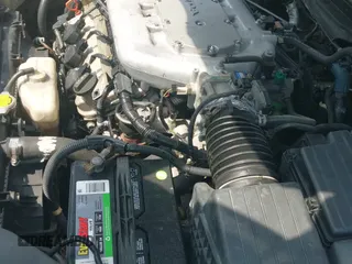 2003 Honda Accord EX z VIN 1HGCM66533A009461, wystawiony jako IAAI lot #42898064 z przebiegiem 172 862 mil mil oraz . Historia ofert i sprzedaży dostępna na DreamBid. Obrazek 19.