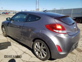 2017 Hyundai Veloster with VIN KMHTC6AD8HU318439, listed as a Copart auction lot 43322083 with 64,664 mi miles. Bid and sale history available at carsss.com. Image 2.