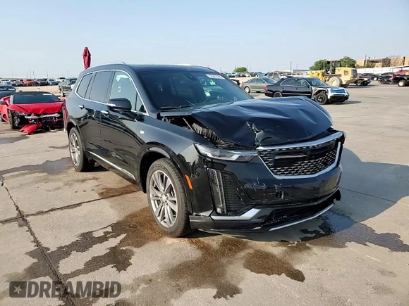 2021 Cadillac XT6 Premium Luxury z VIN 1GYKPCRS3MZ195999, wystawiony jako Copart lot #53261595 z przebiegiem 81 843 mil mil oraz Szkoda całkowita • Salvage title. Historia ofert i sprzedaży dostępna na DreamBid. Obrazek 14.
