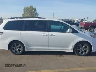 2012 Toyota Sienna SE with VIN 5TDXK3DC1CS221798, listed as a IAAI auction lot 41989210 with 198,962 mi miles. Bid and sale history available at carsss.com. Image 14.