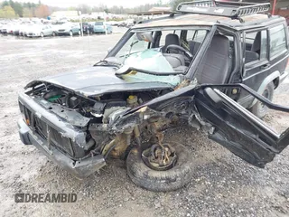 1998 Jeep Cherokee Sport z VIN 1J4FJ68S7WL264849, wystawiony jako IAAI lot #41931068 z przebiegiem Nie podano mil oraz . Historia ofert i sprzedaży dostępna na DreamBid. Obrazek 6.