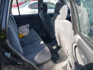 1998 Honda CR-V LX z VIN JHLRD1740WC076533, wystawiony jako IAAI lot #42046673 z przebiegiem 201 946 mil mil oraz . Historia ofert i sprzedaży dostępna na DreamBid. Obrazek 8.