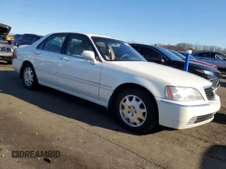 2004 Acura RL w/Navigation System with VIN JH4KA96684C004211, listed as a Copart auction lot 82308804 with 157,256 mi miles and Salvage Title. Bid and sale history available at carsss.com. Image 4.