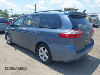 2015 Toyota Sienna LE AAS with VIN 5TDKK3DC1FS642029, listed as a IAAI auction lot 42618738 with 201,344 mi miles and . Bid and sale history available at DreamBid. Image 3.