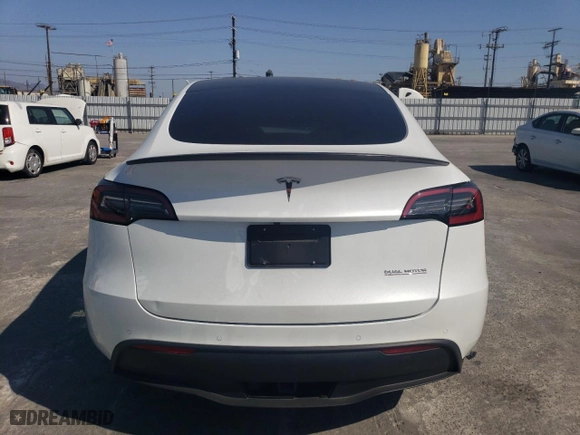 2022 Tesla Model Y Performance with VIN 7SAYGDEF8NF495109, listed as a Copart auction lot 66901914 with 16,748 mi miles and Salvage Title. Bid and sale history available at carsss.com. Image 6.
