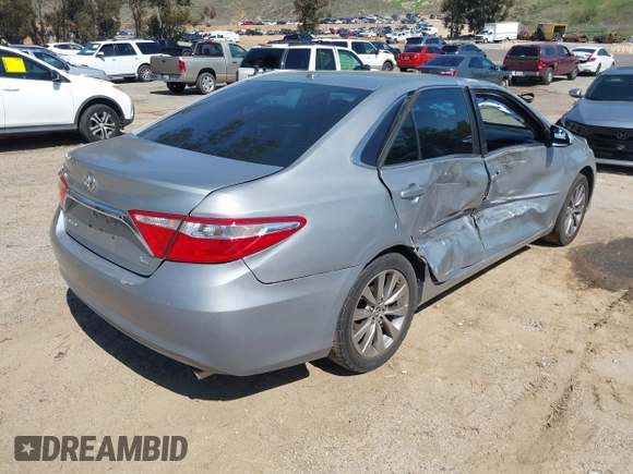2015 Toyota Camry XLE with VIN 4T1BF1FK6FU882262, listed as a IAAI auction lot 41819208 with 123,173 mi miles and . Bid and sale history available at DreamBid. Image 4.