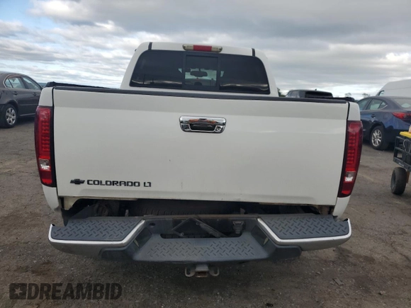 2008 Chevrolet Colorado z VIN 1GCDT43E088221344, wystawiony jako Copart lot #57488905 z przebiegiem 164 665 mil mil oraz Szkoda całkowita • Salvage title. Historia ofert i sprzedaży dostępna na DreamBid. Obrazek 6.