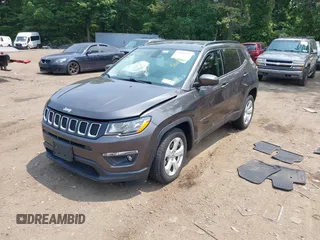 2019 Jeep Compass Altitude with VIN 3C4NJDBB1KT734970, listed as a IAAI auction lot 42483357 with 59,425 mi miles and . Bid and sale history available at DreamBid. Image 17.