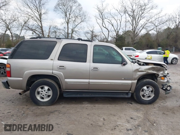 2002 Chevrolet Tahoe LT with VIN 1GNEC13Z22J256805, listed as a IAAI auction lot 41302460 with 249,578 mi miles and . Bid and sale history available at DreamBid. Image 13.