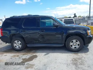 2013 Chevrolet Tahoe LS with VIN 1GNSCAE04DR104790, listed as a IAAI auction lot 42225652 with 119,948 mi miles and . Bid and sale history available at DreamBid. Image 13.