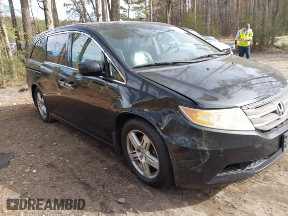 2013 Honda Odyssey Touring with VIN 5FNRL5H96DB003796, listed as a IAAI auction lot 41828376 with 6,308 mi miles and . Bid and sale history available at carsss.com. Image 1.