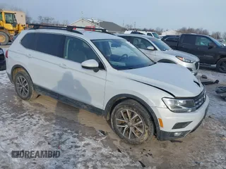 2018 Volkswagen Tiguan SEL z VIN 3VV3B7AX6JM019051, wystawiony jako IAAI lot #41341097 z przebiegiem 85 569 mil mil oraz . Historia ofert i sprzedaży dostępna na DreamBid. Obrazek 1.