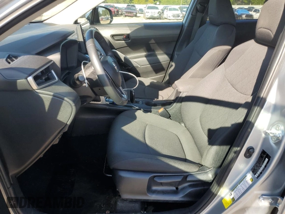 2022 Toyota Corolla Cross LE with VIN 7MUCAAAG0NV010646, listed as a Copart auction lot 72151744 with 59,273 mi miles and Salvage title. Bid and sale history available at DreamBid. Image 7.