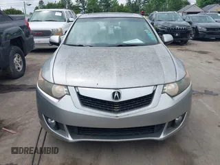 2010 Acura TSX with VIN JH4CU2F60AC019462, listed as a IAAI auction lot 42109261 with 112,131 mi miles. Bid and sale history available at carsss.com. Image 6.