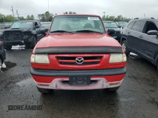 2001 Mazda B-Series Truck SX z VIN 4F4YR13U91TM06525, wystawiony jako Copart lot #59030105 z przebiegiem 145 271 mil mil oraz Tytuł czysty. Historia ofert i sprzedaży dostępna na DreamBid. Obrazek 5.