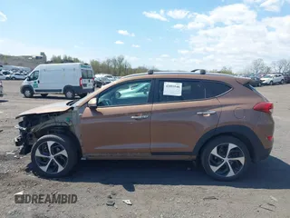 2016 Hyundai Tucson Eco with VIN KM8J3CA26GU207956, listed as a IAAI auction lot 42093540 with 87,380 mi miles. Bid and sale history available at carsss.com. Image 14.