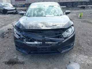 2017 Honda Civic Sedan EX-T with VIN 19XFC1F32HE204861, listed as a IAAI auction lot 42031039 with 61,043 mi miles. Bid and sale history available at carsss.com. Image 6.