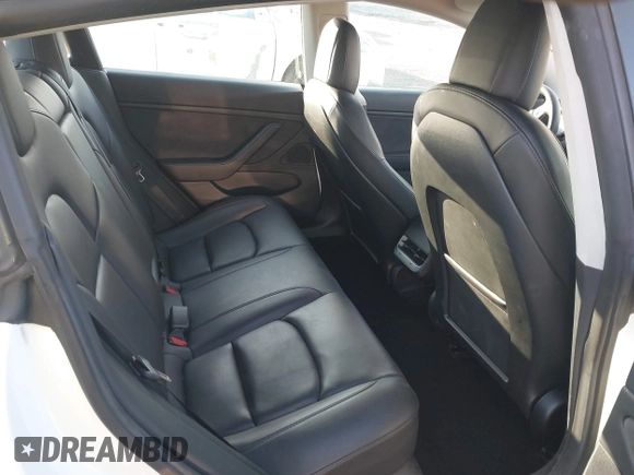 2021 Tesla Model 3 Long Range z VIN 5YJ3E1EB0MF936609, wystawiony jako IAAI lot #41599411 z przebiegiem 55 993 mil mil oraz . Historia ofert i sprzedaży dostępna na DreamBid. Obrazek 8.