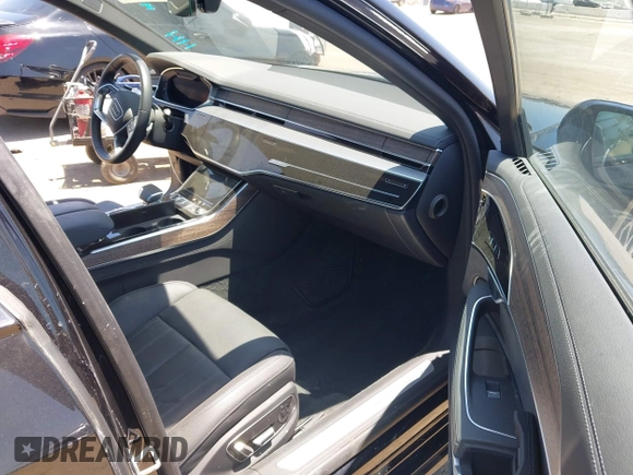 2024 Audi A8 with VIN WAULDAF89RN003075, listed as a IAAI auction lot 42502959 with 4,409 mi miles and . Bid and sale history available at DreamBid. Image 5.