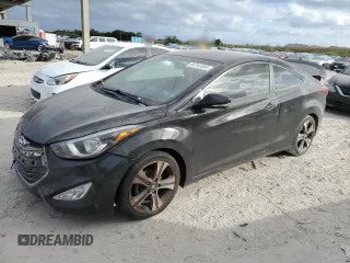 2014 Hyundai Elantra Coupe with VIN KMHDH6AH0EU026496, listed as a Copart auction lot 84742554 with 112,670 mi miles and Clean Title. Bid and sale history available at carsss.com. Image 1.