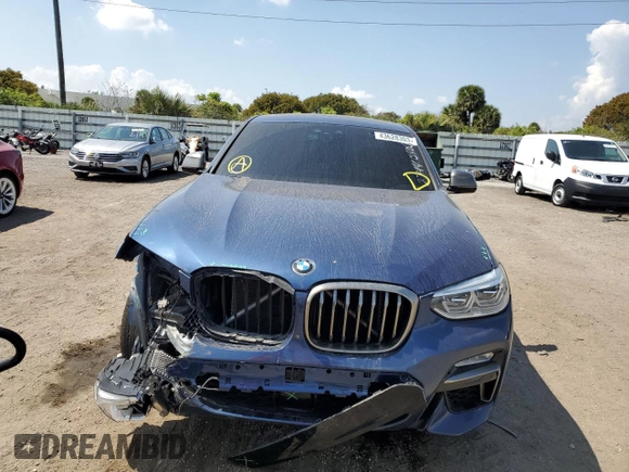 2019 BMW X4 M40i with VIN 5UXUJ5C57KLJ62744, listed as a Copart auction lot 43628303 with 31,448 mi miles. Bid and sale history available at carsss.com. Image 5.
