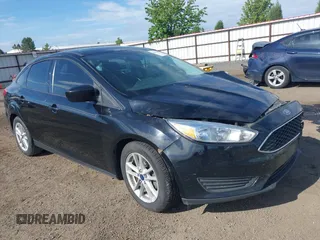 2018 Ford Focus SE z VIN 1FADP3F20JL288437, wystawiony jako IAAI lot #42278885 z przebiegiem 132 504 mil mil oraz . Historia ofert i sprzedaży dostępna na DreamBid. Obrazek 1.