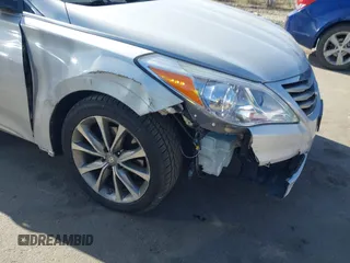 2015 Hyundai Azera z VIN KMHFG4JG0FA453994, wystawiony jako IAAI lot #42002922 z przebiegiem 102 094 mil mil oraz . Historia ofert i sprzedaży dostępna na DreamBid. Obrazek 6.