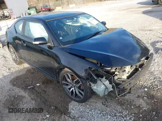 2015 Scion tC z VIN JTKJF5C71FJ009326, wystawiony jako IAAI lot #41588230 z przebiegiem 283 796 mil mil oraz . Historia ofert i sprzedaży dostępna na DreamBid. Obrazek 1.