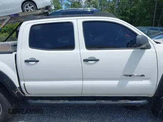 2009 Toyota Tacoma PreRunner with VIN 3TMJU62NX9M091048, listed as a IAAI auction lot 42272791 with 208,257 mi miles and . Bid and sale history available at DreamBid. Image 13.